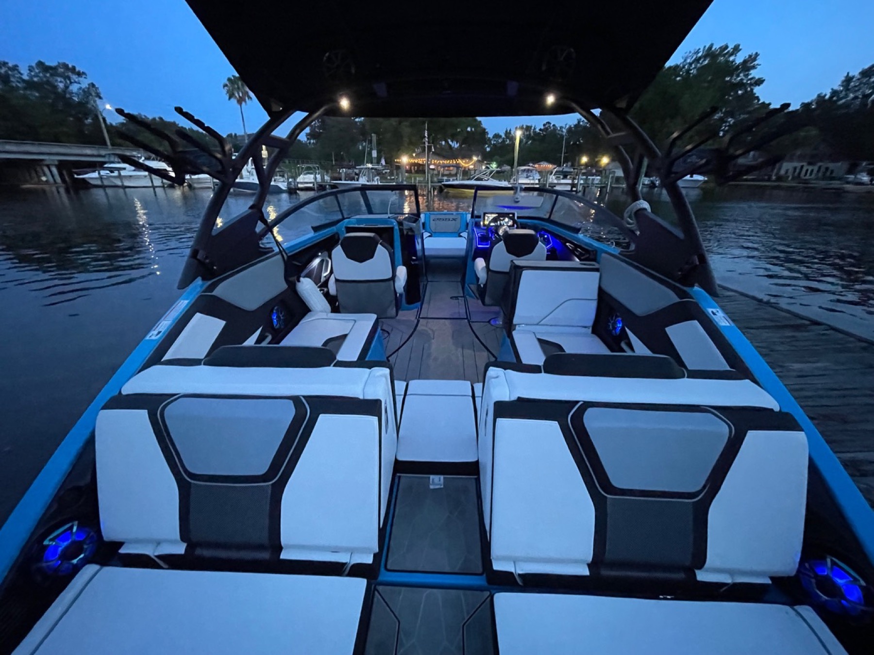 Evening boat seating with marina lights