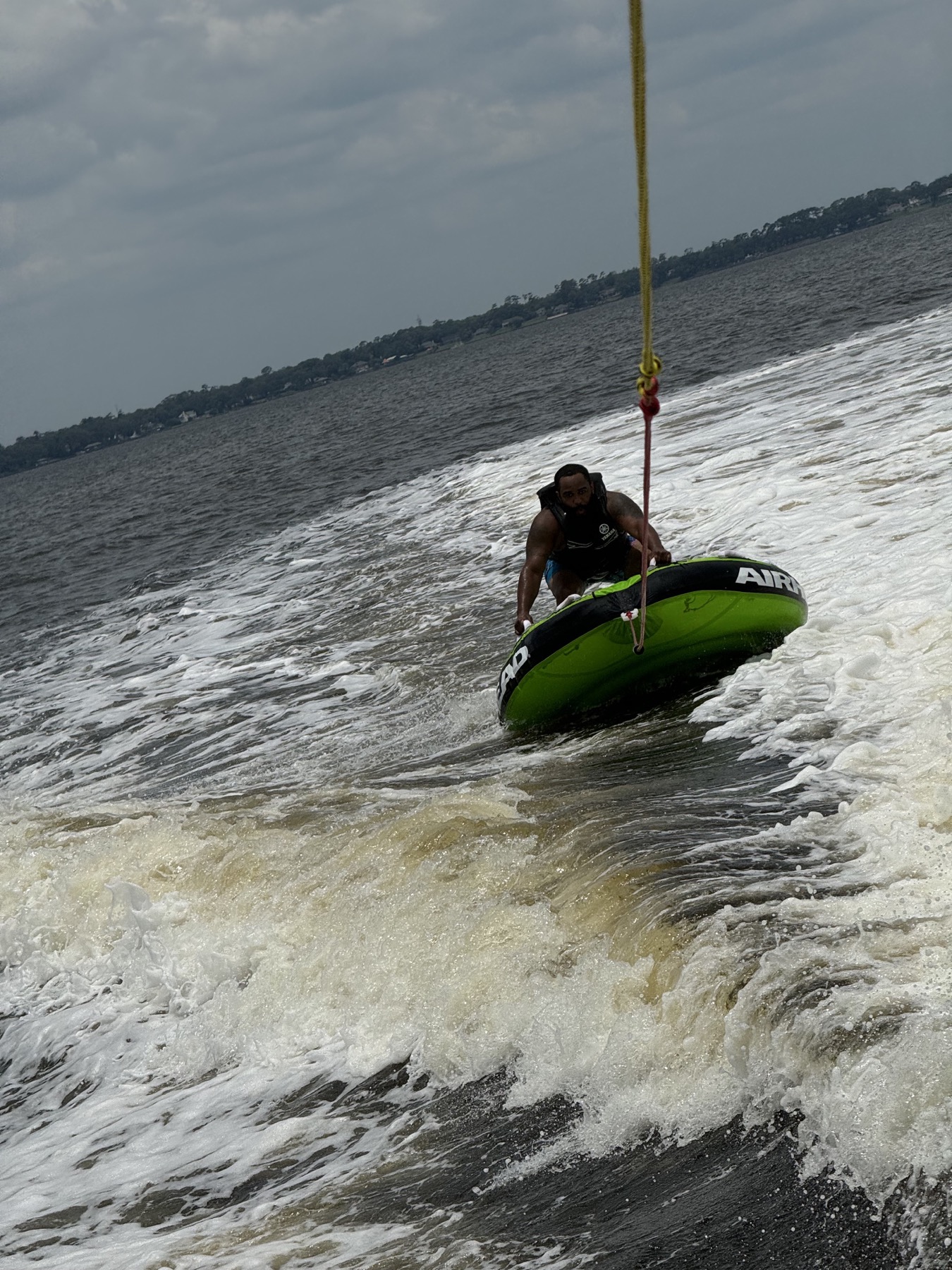 Tubing behind the charter boat